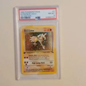 Hitmonlee - Pokemon Fossil First 1st Edition #7 - Near Mint to Mint PSA 8